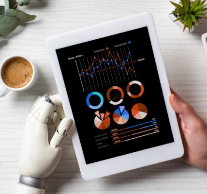 Rola sztucznej inteligencji w nowoczesnych strategiach marketingowych 5 partial-view-of-businessman-with-cyborg-hand-using-2024-11-17-17-54-39-utc